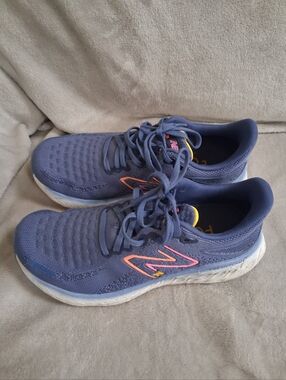 New Balance Purple Running Shoes with Pink and Yellow Accents